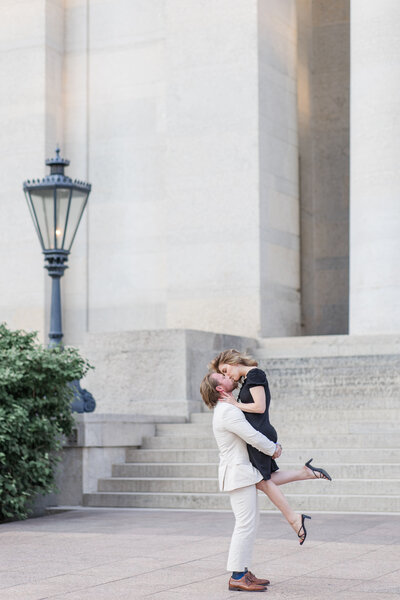 Bride and groom walk up memorial steps at their DC wedding