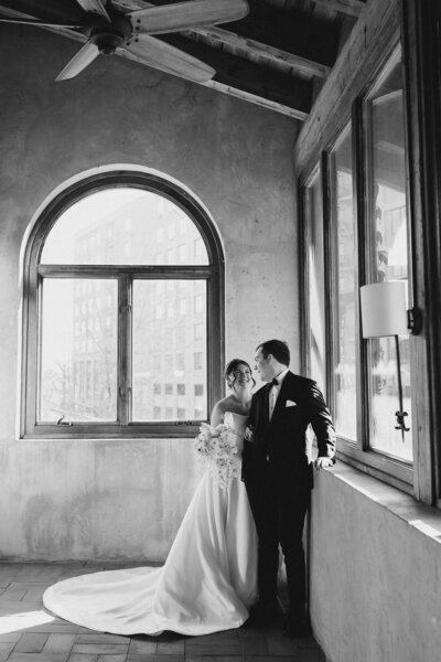 Bride and groom walk up memorial steps at their DC wedding