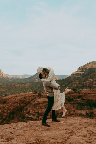 couple dancing in sedona red rocks 