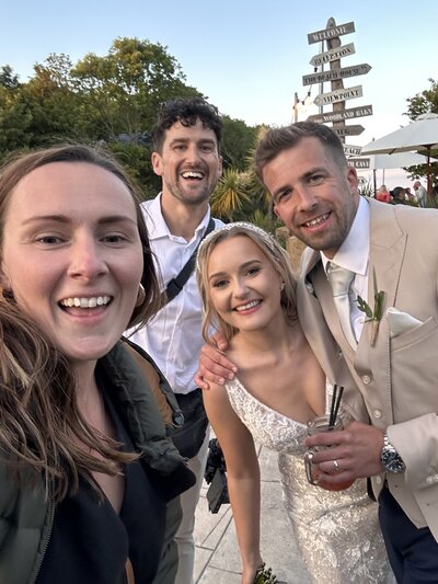 Amy & Nick posing with couple