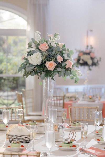 Wedding reception center piece florals at Penn Oaks Golf Club. Photo by Christopher Ginn Studios.