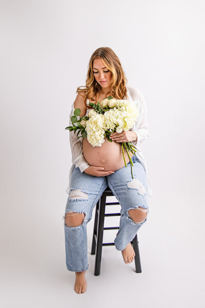 Maternity Studio Session Boyfriend Jeans and White Hydrangeas in Bridgeport, TX