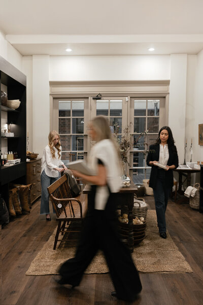 Lifestyle branding photo of a design team in action inside a creative studio space — Greenville SC photography by Dani Lacey Photographs.