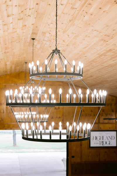 Rustic chandelier in Highland Ridge Barn venue