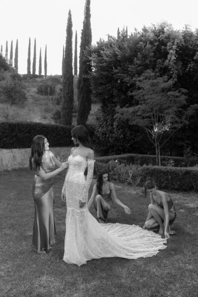 bride with bridesmaids candid photo