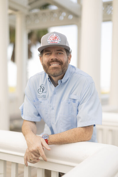 Portrait of Matthew Dillard, founder of Dillard Signature Living, a Galveston home builder known for timeless craftsmanship, integrity, and coastal-inspired design across new construction and remodeling projects.