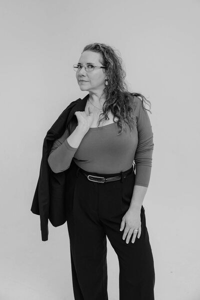 Photographer helping to select outfits to wear for photoshoot