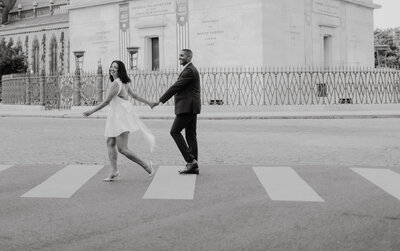 Engaged couple standing at memorial in DC, during shoot with baltimore wedding  photography