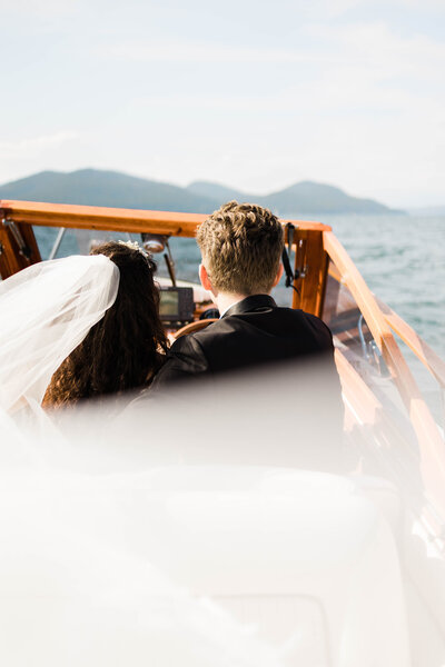 bride and groom hold hands during intimate wedding ceremony in montana