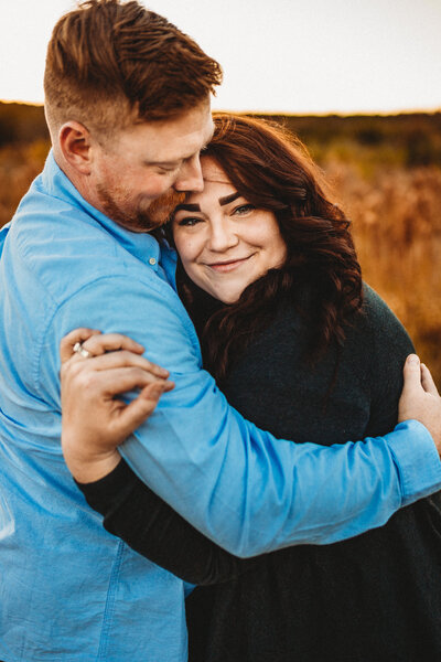 Couple embracing each other during their photoshoot