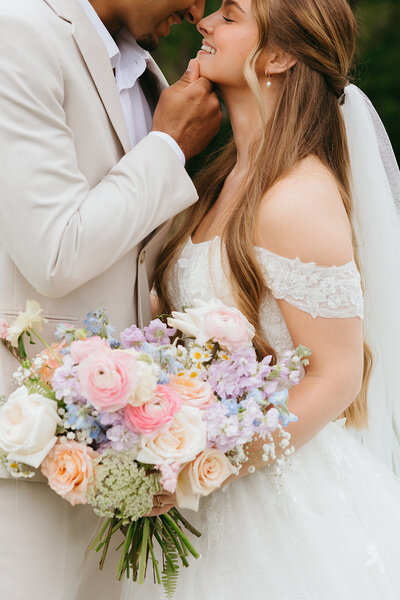 Bride and Groom embrace during bridal portraits at the Barn at Grace Hill - Ashley Cole Photography
