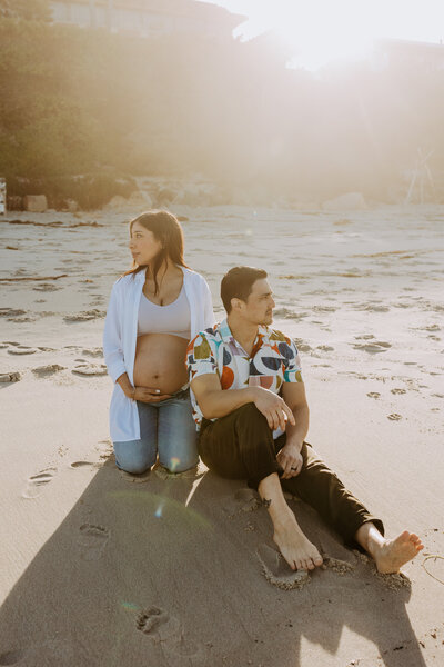 Natural Candid Documentary Family Maternity Baby Pregnancy Announcement Photo shoot at La Jolla Windansea beach at sunset - Couples Mom and Dad San Diego Maternity Photographer