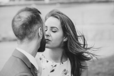 Black and white photo of a couple about to kiss