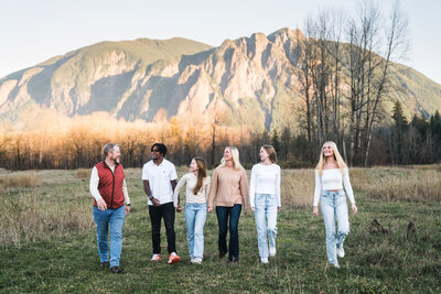 Family walking in front of Mount Si during Snoqualmie Portrait Session