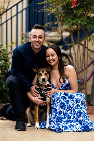 Couple portraits of Paul Michael Cooper, San Diego wedding photographer and his partner enjoying some drinks with string lights in the background