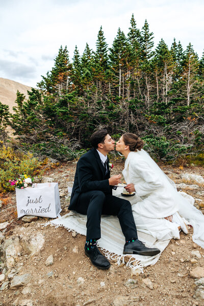 Boulder Wedding Photographer captures grooms holding hands after elopement