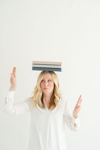Louisville Ky maternity photographer, Julie Brock laughs while taking pictures at her studio