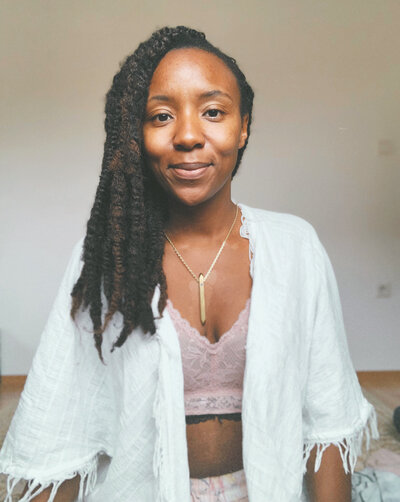 Nat Martin smiles.