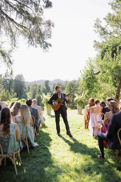 Austin Texas acoustic wedding guitarist performing live during a luxury outdoor ceremony