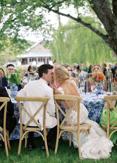 Picture of wedding photographer in Virginia holding camera.