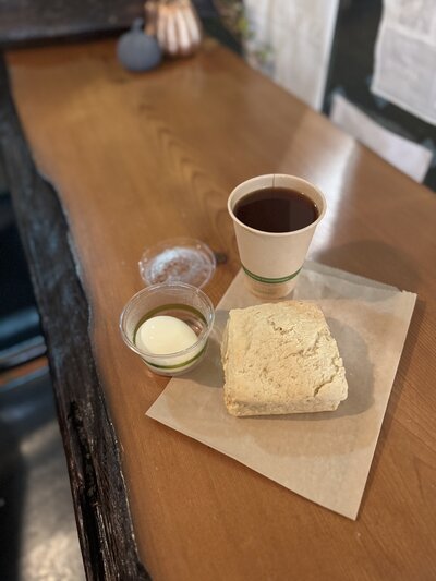 Free community meal from Grain Artisan Bakery in Snohomish, WA — includes a gluten-free scone, organic boiled egg, and Americano or tea, crafted to support those in need.