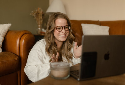 Brittany Fitch, founder of Larks Atelier speaking with a female photographer on needs for her custom web design project