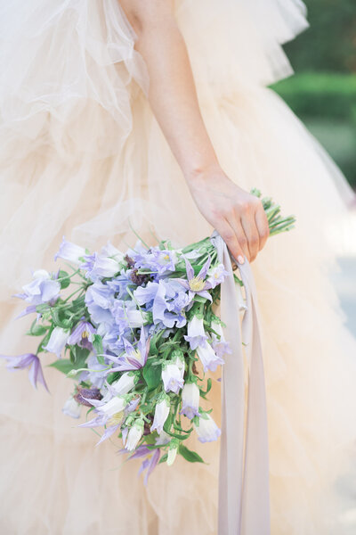 bridal bouquet held by a bride during her bridal session at Rice University in Houston Texas by Swish and Click Photography