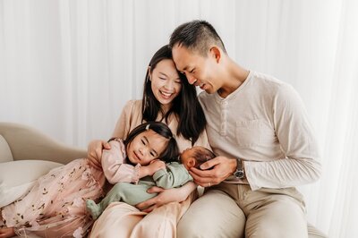 family of 4 during yearly studio portraits