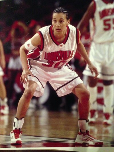 Marcia playing Division I college basketball at the University of Louisville as a shooting guard. 