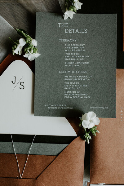 Dark green wedding invitation with brown and white envelope