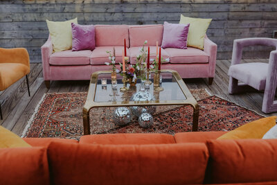 vintage wedding lounge area with velvet couches