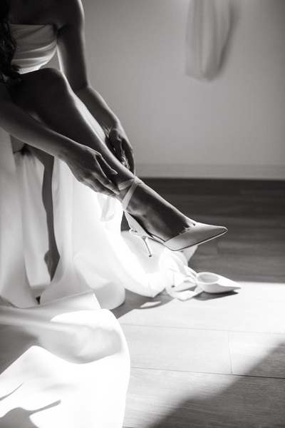 Vintage-Bride-Putting-On-Shoes-Classy-5104