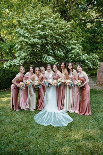 Bride with bridesmaids in pink