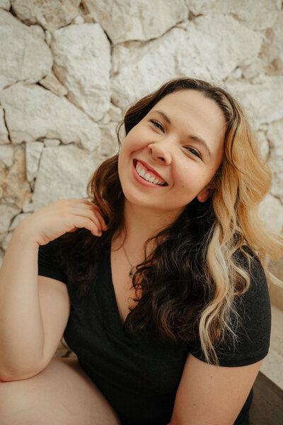 woman kissing infant
