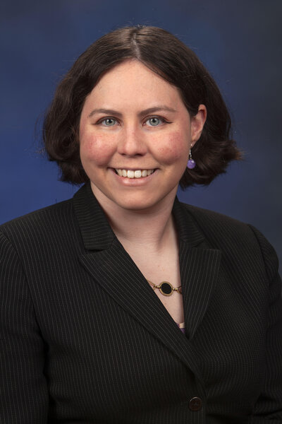 A poster of Linda Rogers Luxury Real Estate in a train station