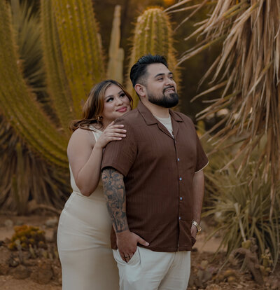 bride and groom looking off into the distance