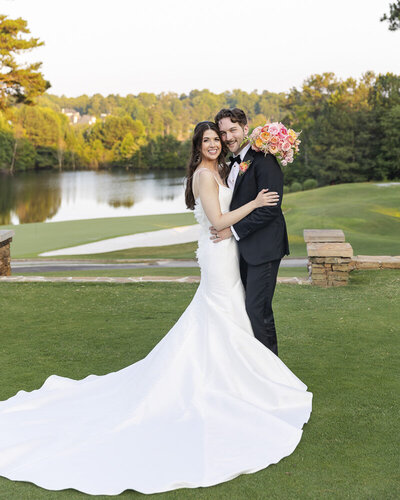 bride and groom kissing under the veil