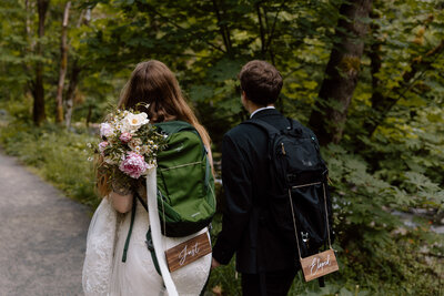 Couple hiking with backpacks.