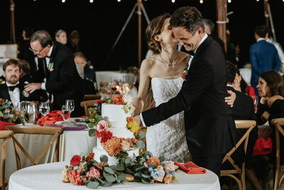 Bride and Groom cutting cake, Buxton School wedding