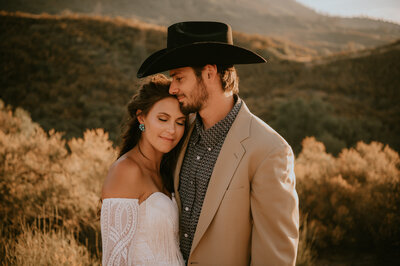 western wedding couple at sunset bridals