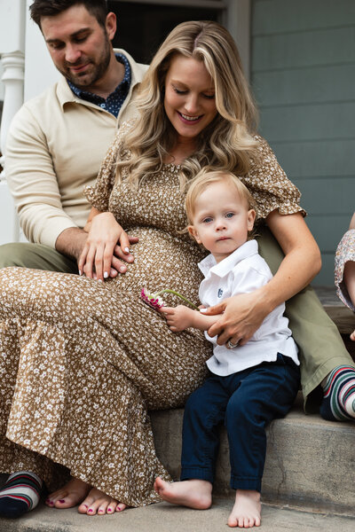 Maternity photo of Mom, Dad and big brother.