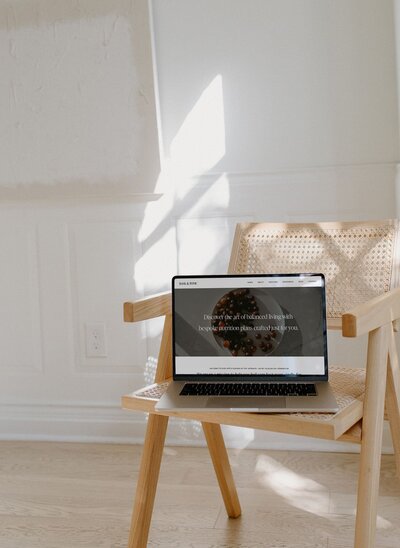 MacBook mockup showcasing a custom Showit website design by VERVE & COLOR