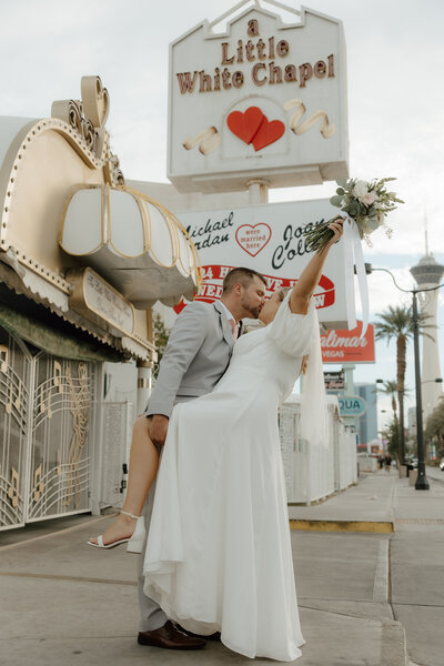 just-married-couple-kissing-little-white-chapel-las-vegas-meg-pearson-photography-midwest
