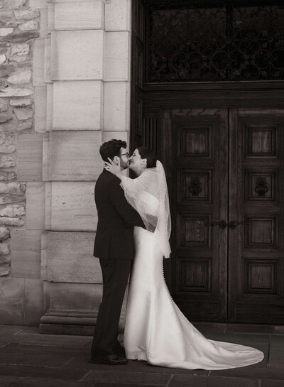 bride and groom kissing in winston salem, NC.