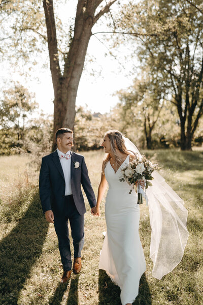 Wedding couple walking in nature