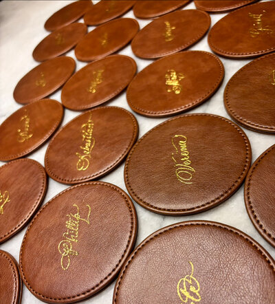 Carla Schall gold foiled leather coasters for a private event at the One Hotel in Miami
