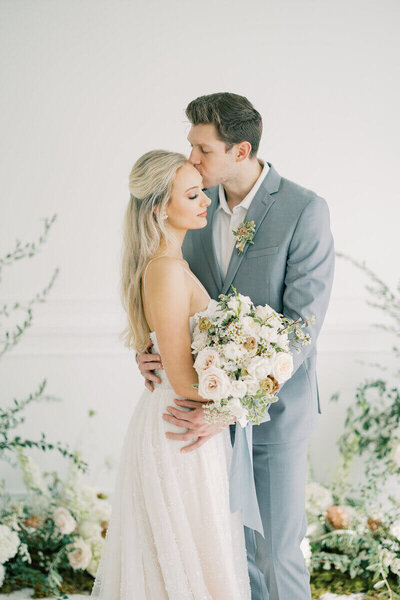 Bride and groom embracing at event planned by event planner minneapolis mn.