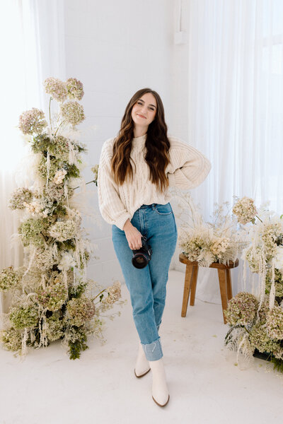 A wedding photographer in the studio.