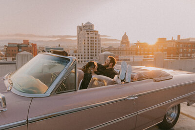 couple in vintage car, captured by idaho wedding photographer