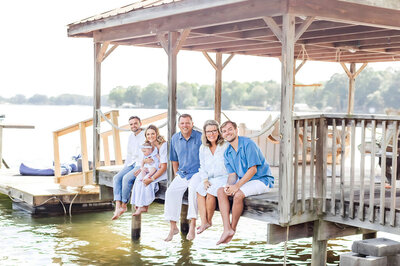Extended family photo session on family owned dock on Lake Norman